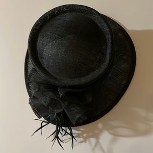 This elegant black hat is just right for church or attending the Kentucky Derby!